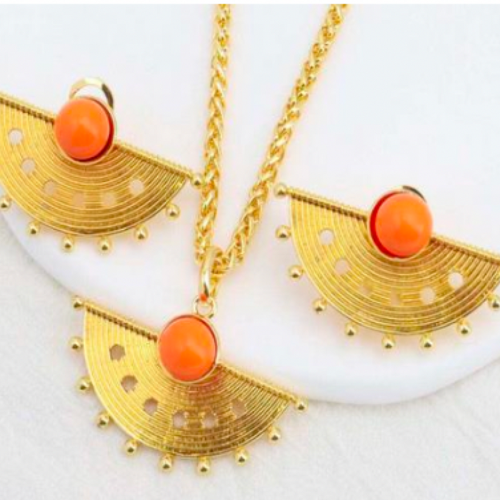 Gold necklace with orange beads 
