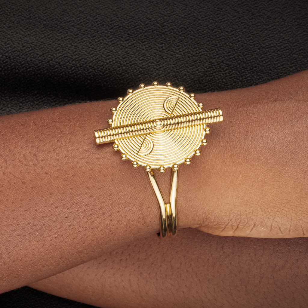 Gold bracelet with intricate design 